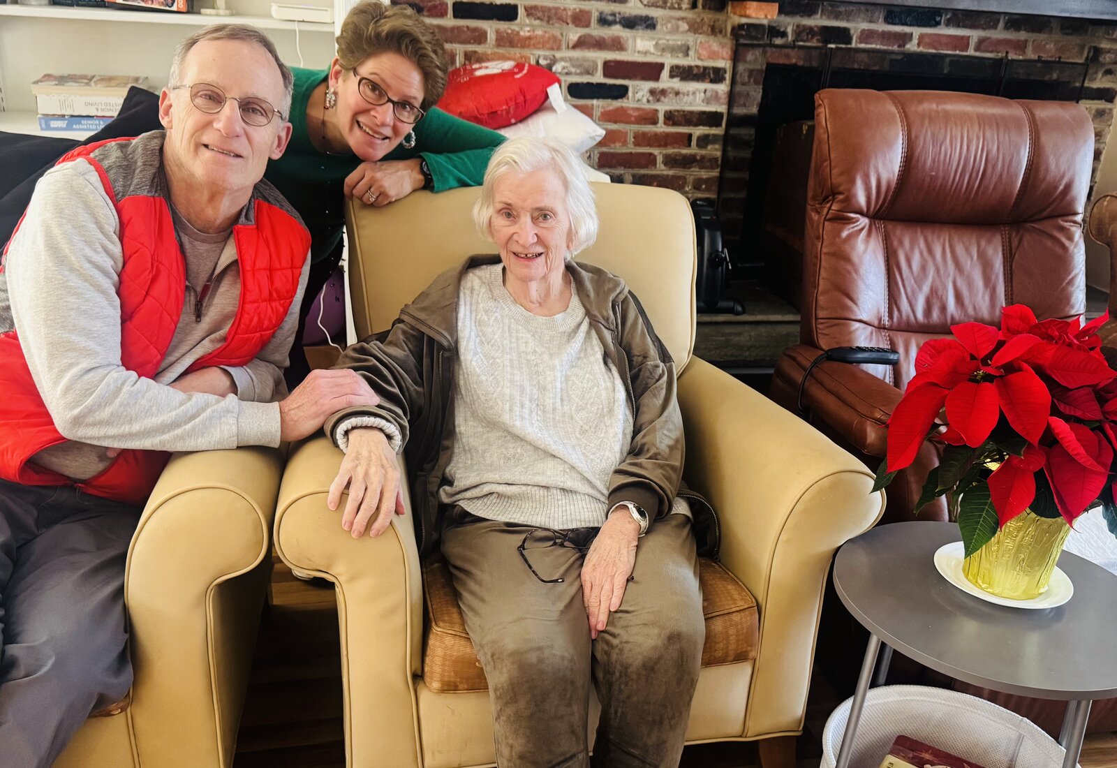 Family visiting with a resident in the living room